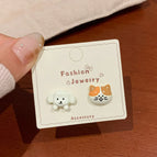 KTW41 Orange Cat and White Dog