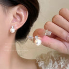 Exquisite pearl flashing zirconium stud earrings