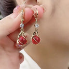 E318 Red Cat Eye / 925 Silver