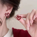 Hollow heart ear studs