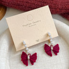 EF2 Bow Tie Pearl C-shaped Earrings