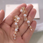 A Pair of Flower and Branch Ear Studs