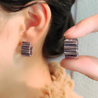 Irregular pleated metal earrings