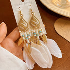 31-Xinjiang Travel Essential White Feather Ear Hook 238