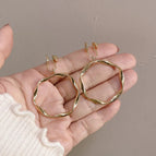 103- Gold Twisted Coil Mosquito Coil Clip-On Earrings
