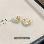 Mint green c-shaped earrings