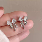 59#Star Zircon Bow Mosquito Coil Clip-On Earrings
