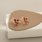 【2261】Five-petal Flower Mosquito Coil Ear Clip