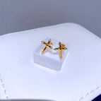 Zircon Cross Gold