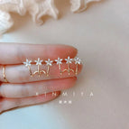 Three zircon flower earrings