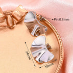 19x24mm (Needle Thickness: 0.7mm) / Glossy Concave-Convex Scallop Earrings (Steel Color) / 1 Pair/Package