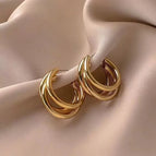 Gold stud earrings