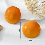 E340-Orange round Studs