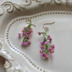 Exquisite handwoven purple flower earrings