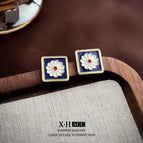 47 # Square Daisy Stud Earrings