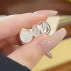 Ice-transparent cat's eye double-sided drop earrings