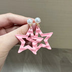 Small hollow five-pointed star earrings