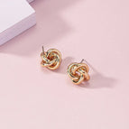Gold stud earrings