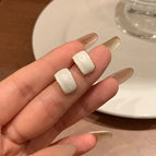66# white oil drop earrings
