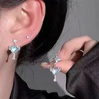Asymmetrical star and moon wings earrings