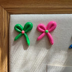 A Pair of Green Rose Pink Spiral Ear Clips