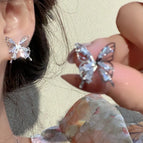 Hollow zircon butterfly stud earrings