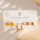 Three Pairs of Diamond Stud Earrings Pink Suit