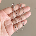67-Silver Twisted Tassel Mosquito Coil Ear Clip