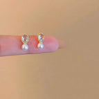 52#Mermaid Heart Pearl Mosquito Coil Ear Clip