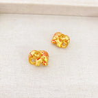 Gold stud earrings