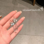 Butterfly tassel earrings