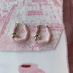 Cream pink u-shaped earrings