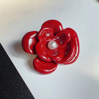 Red brooch