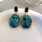 24 # Textured Geometric Earrings