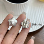 4525--Silver Imitation Leather Star Ear Clip Style Small Size