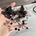 2404379A Black Feather Sparkling Diamond Butterfly (S925 Silver Needle)