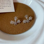 Two snowflake earrings