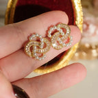 D0142 Hollow Spiral Stud Earrings