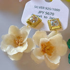 A Pair of White Flower Ear Studs