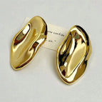 Gold stud earrings