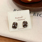 JHW03 Brown Semi-Curved Earrings