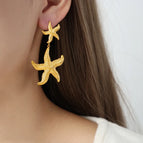 A Pair of Gold Earrings