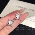 Opal star earrings