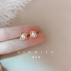 Cross rhinestone pearl earrings