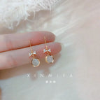 Cat's eye bow earrings