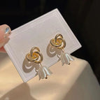 24 golden wrapped flowers