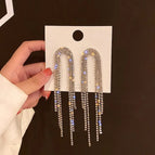 Exaggerated diamond tassel earrings