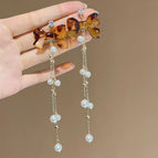 Amber Bow Pearl Tassel Stud Earrings