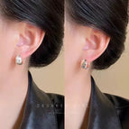 Silver textured hoop earrings