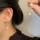 Star and moon pearl earrings
